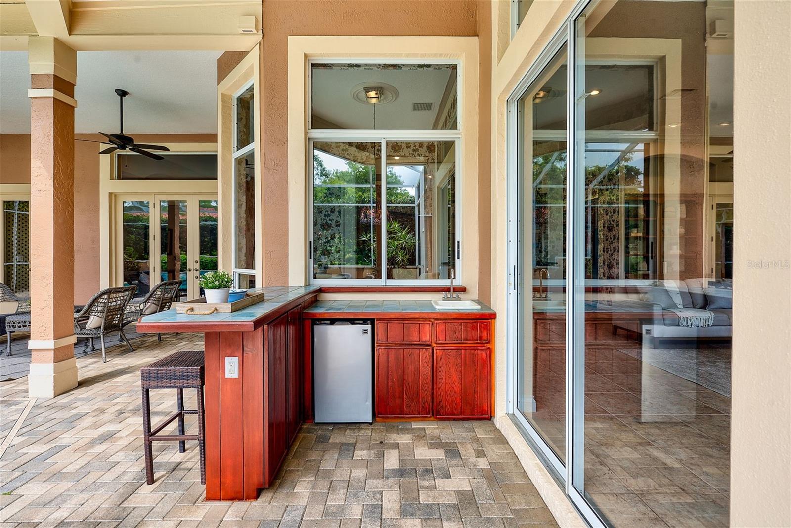 Outdoor kitchen with plenty of storage.