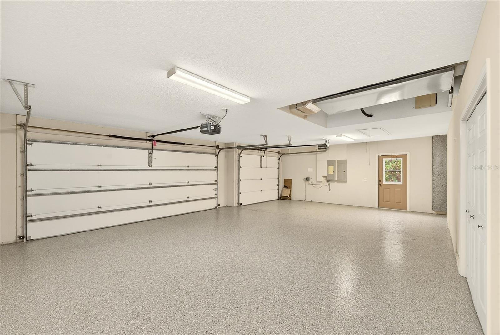 3 Car Garage with epoxy flooring.