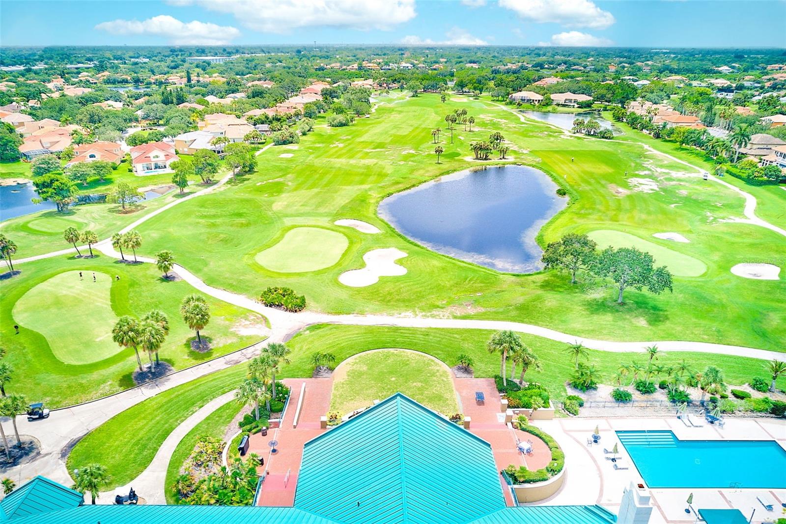Clubhouse and Pool Area overlooking the golf course.