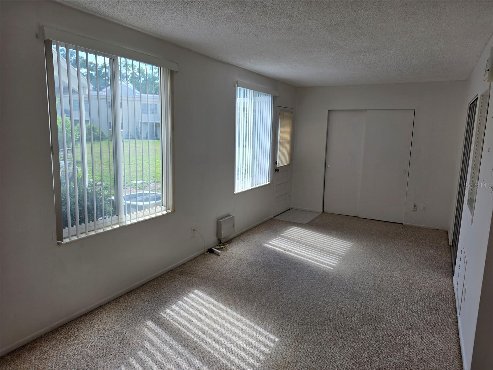 Florida Room/family room  new blinds on ALL WINDOWS