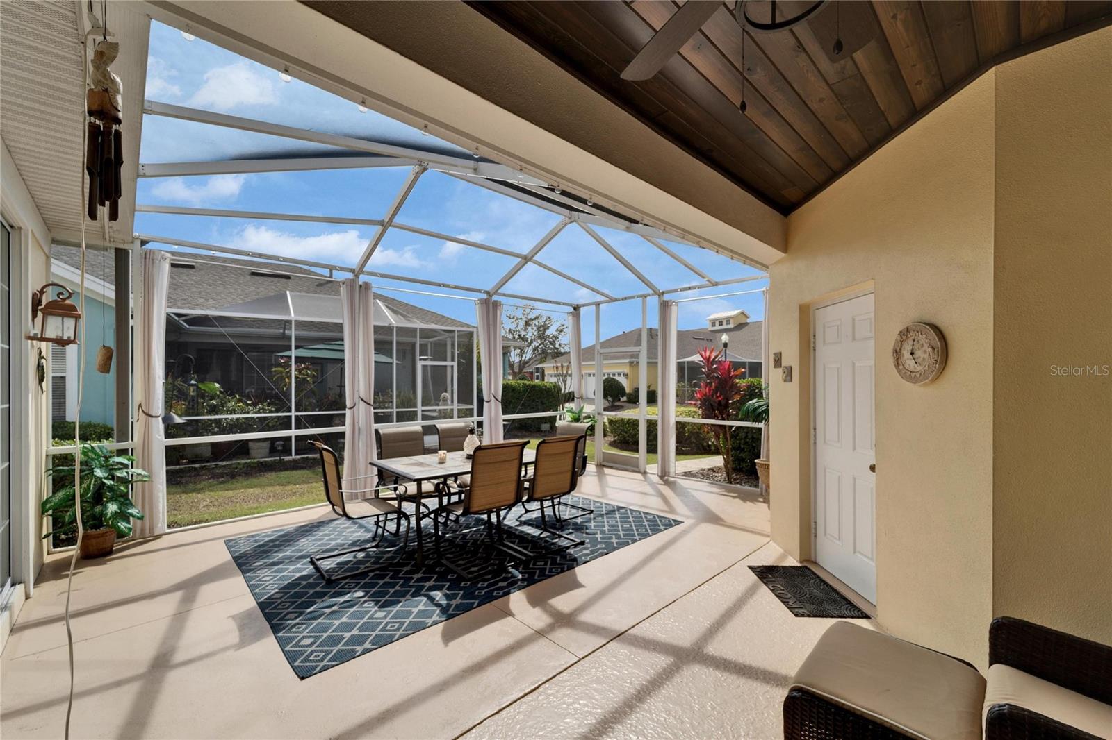 Partially Covered Large Lanai w/Garage Entrance