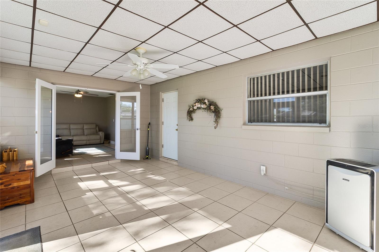 French doors open to spacious Florida Room