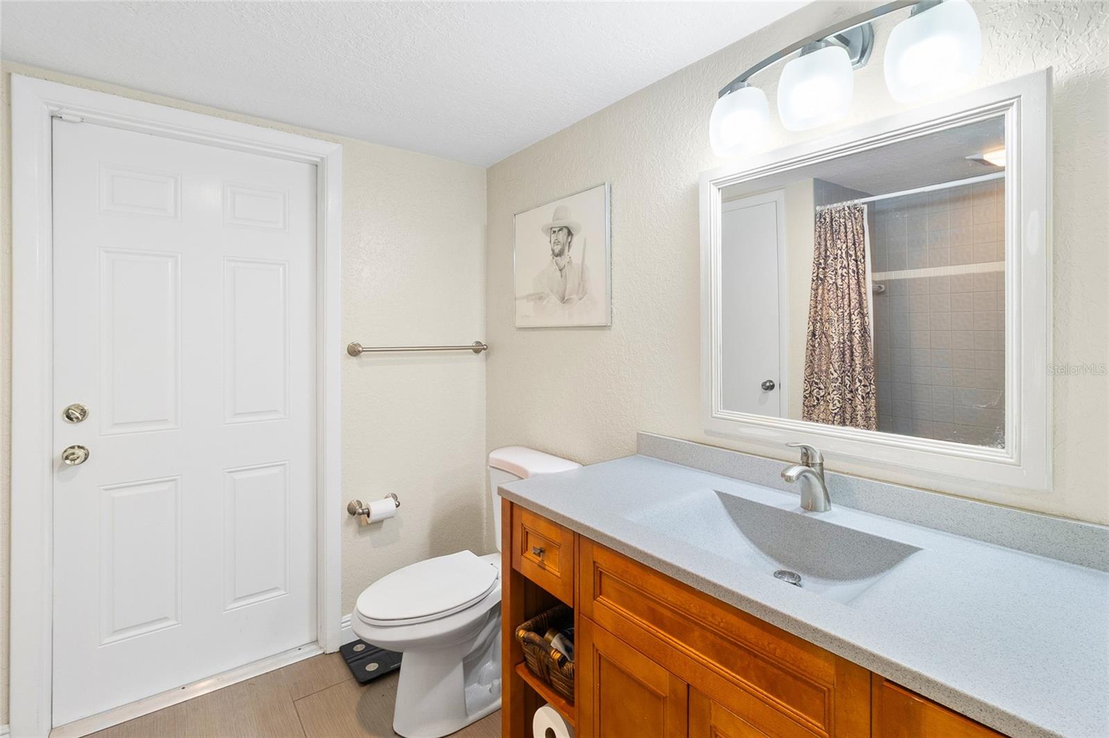 Main bathroom with tub and shower