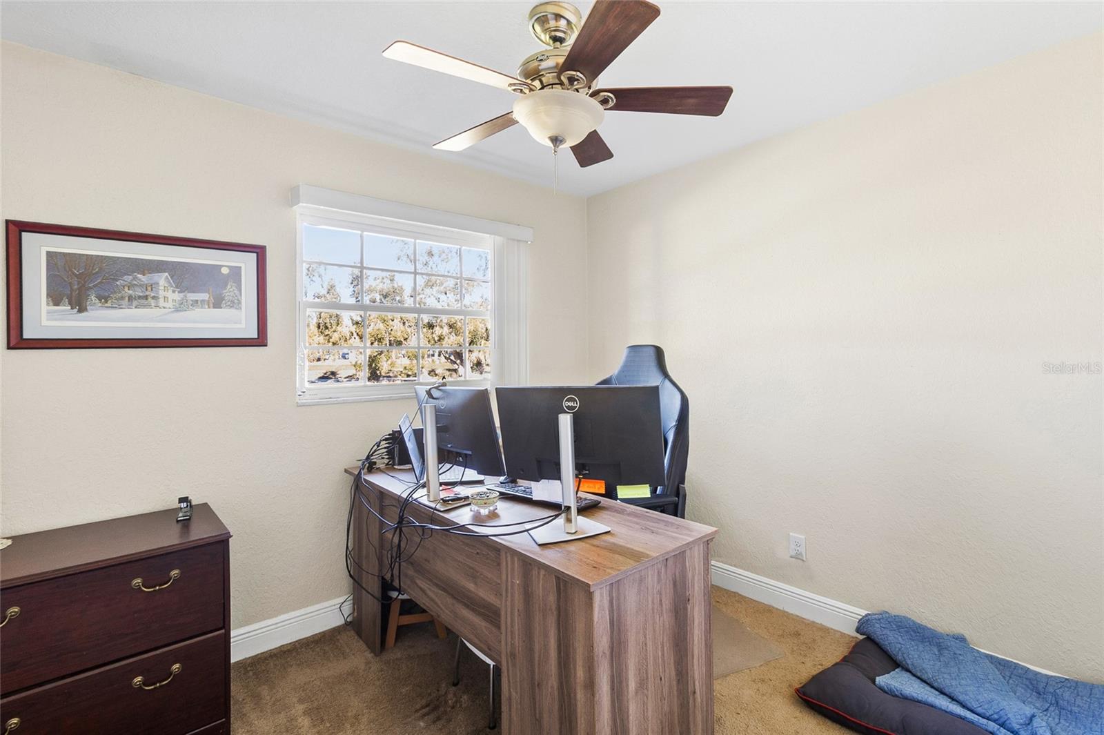 4th Bedroom with ceiling fan now being used as an office