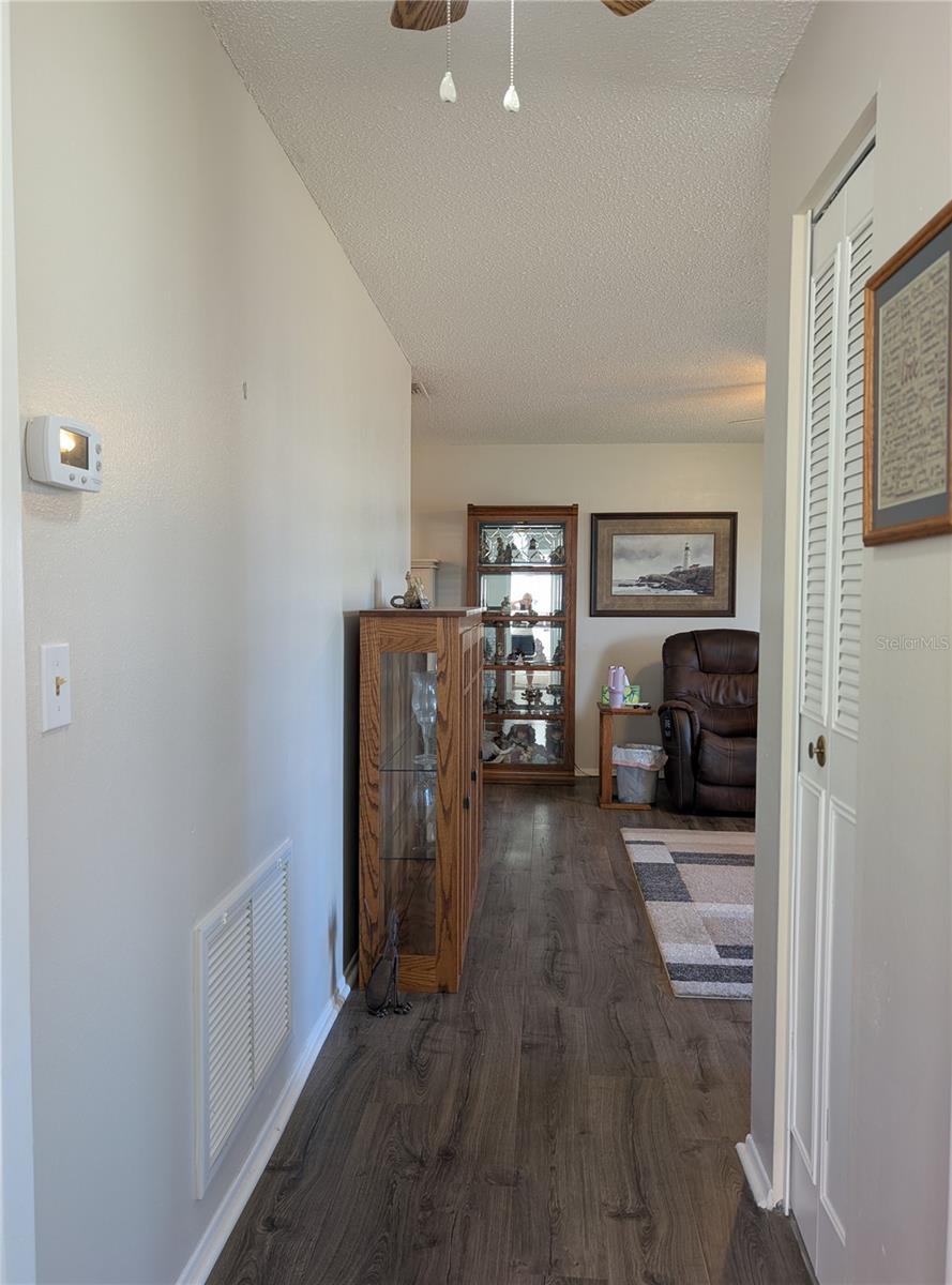 Hallway to back to Living Room