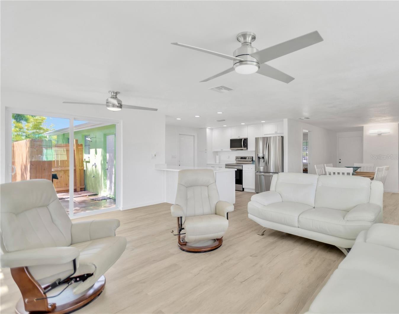 Florida living at its best in this light, bright family room living environment