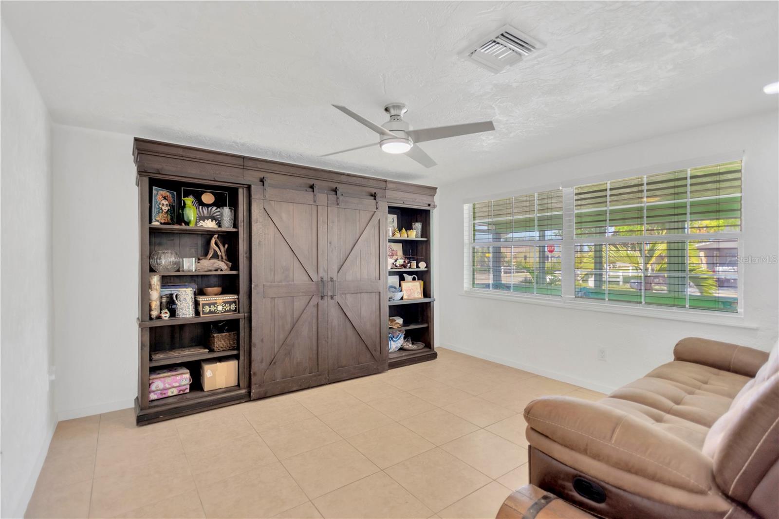 Beautiful Bonus Room located at front of house provides very versatile space.