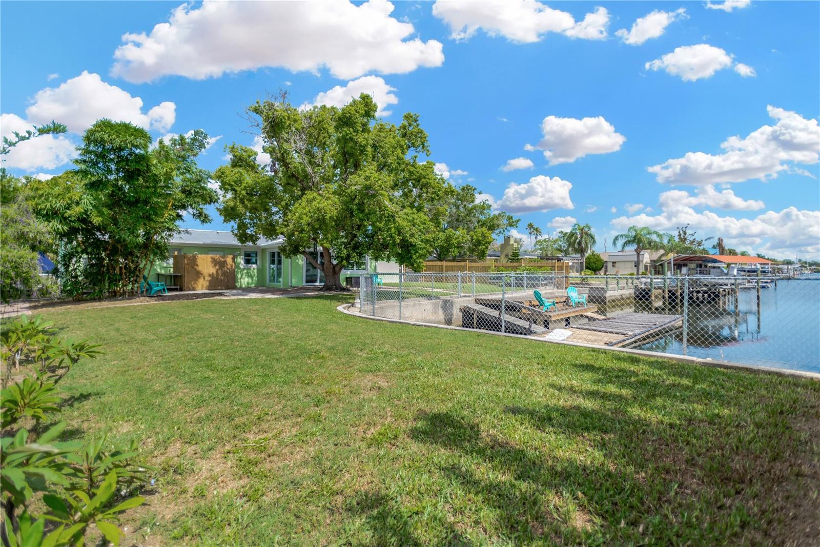 Fully fenced expansive backyard / sparkling water views.