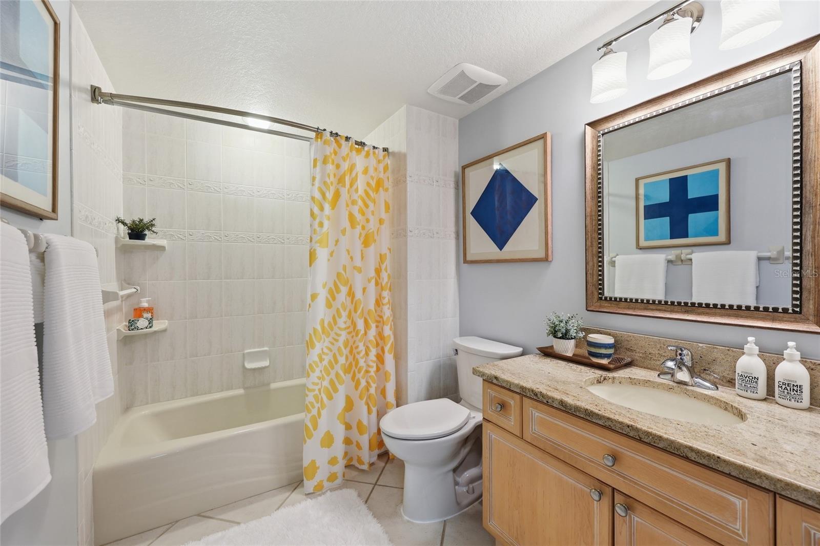 Hall bath with easy access to secondary bedrooms