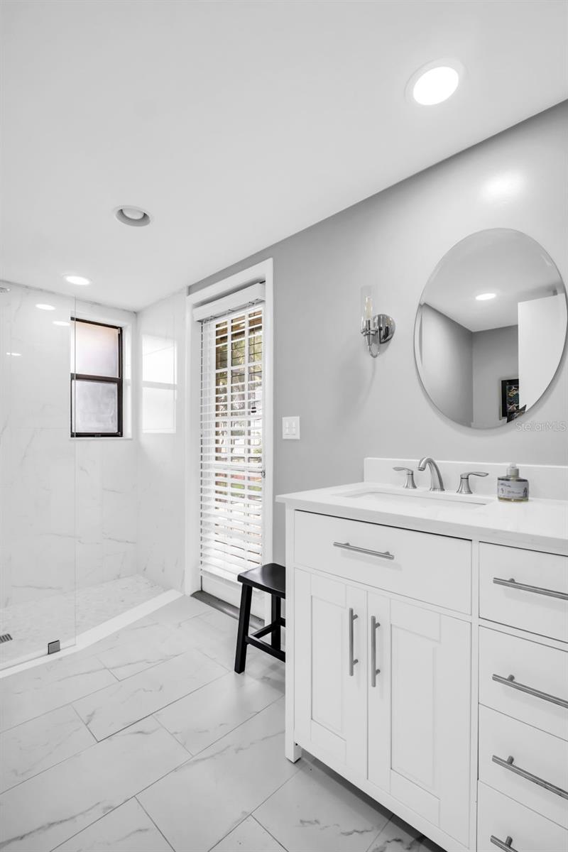 2nd bath leads to pool area