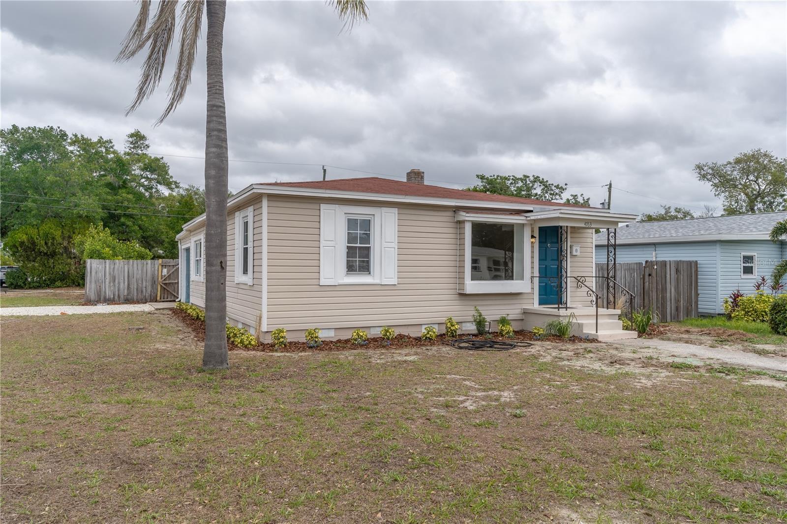 Corner lot, alley access. Room for RV or boat or pool.