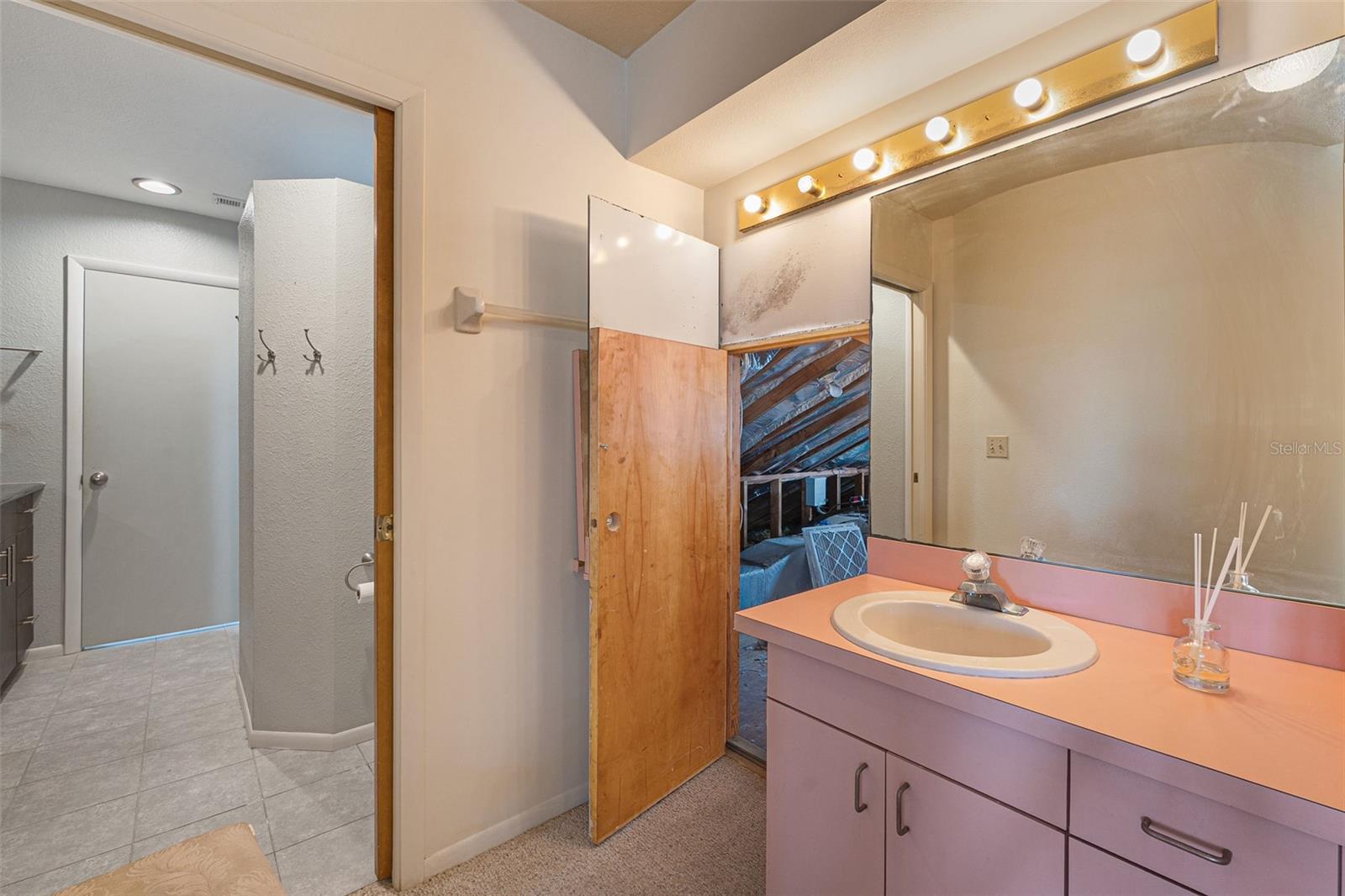 Attice Storage off of the Master Bathroom