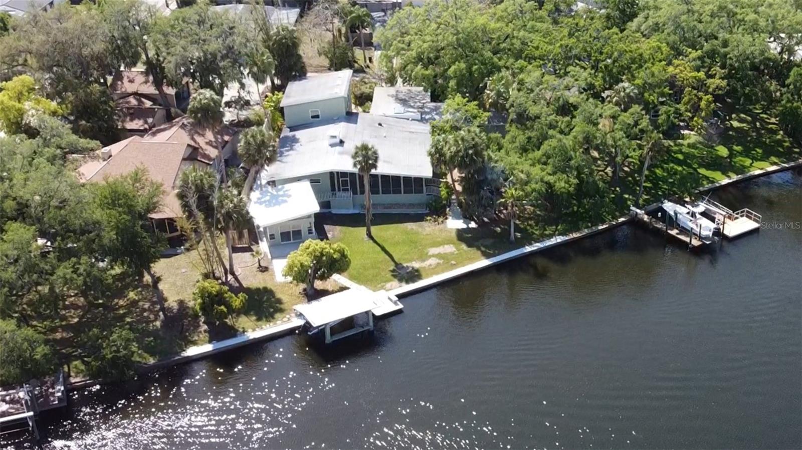 Welcome to your New Waterfront Mid-Century Modern Estate