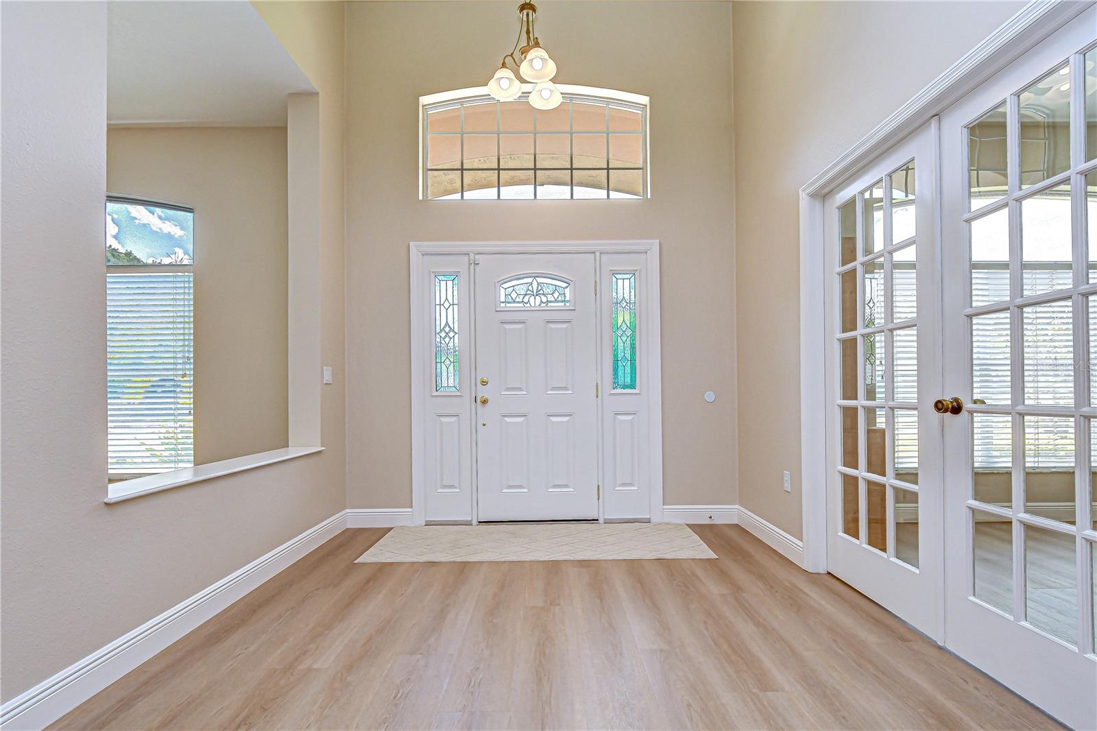 Bright and inviting entryway filled with natural light.