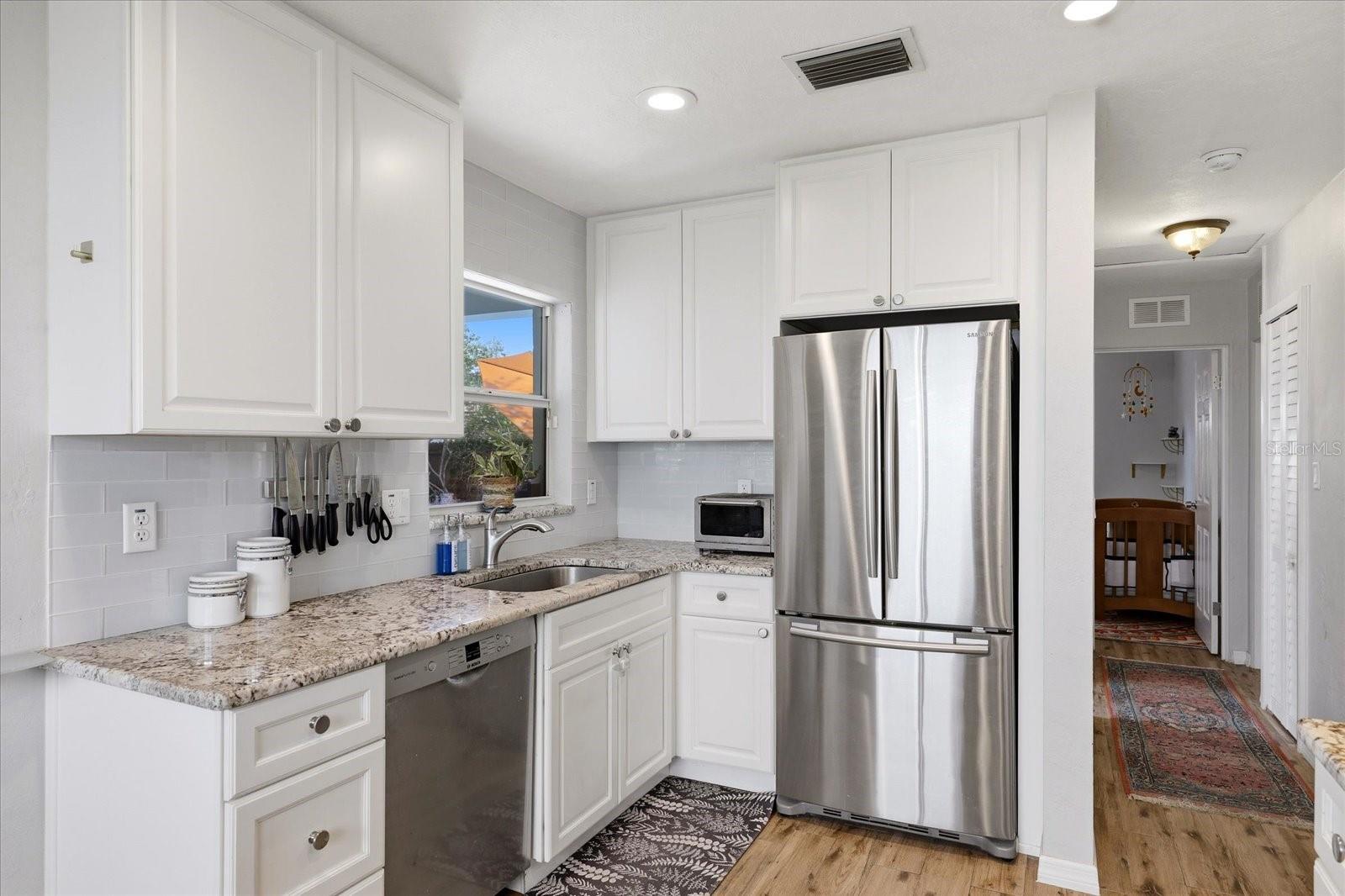 Kitchen with stainless steel appliances and ample cabinetry