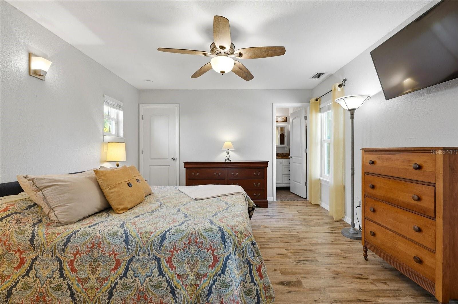 Spacious bedroom with natural light and ensuite access