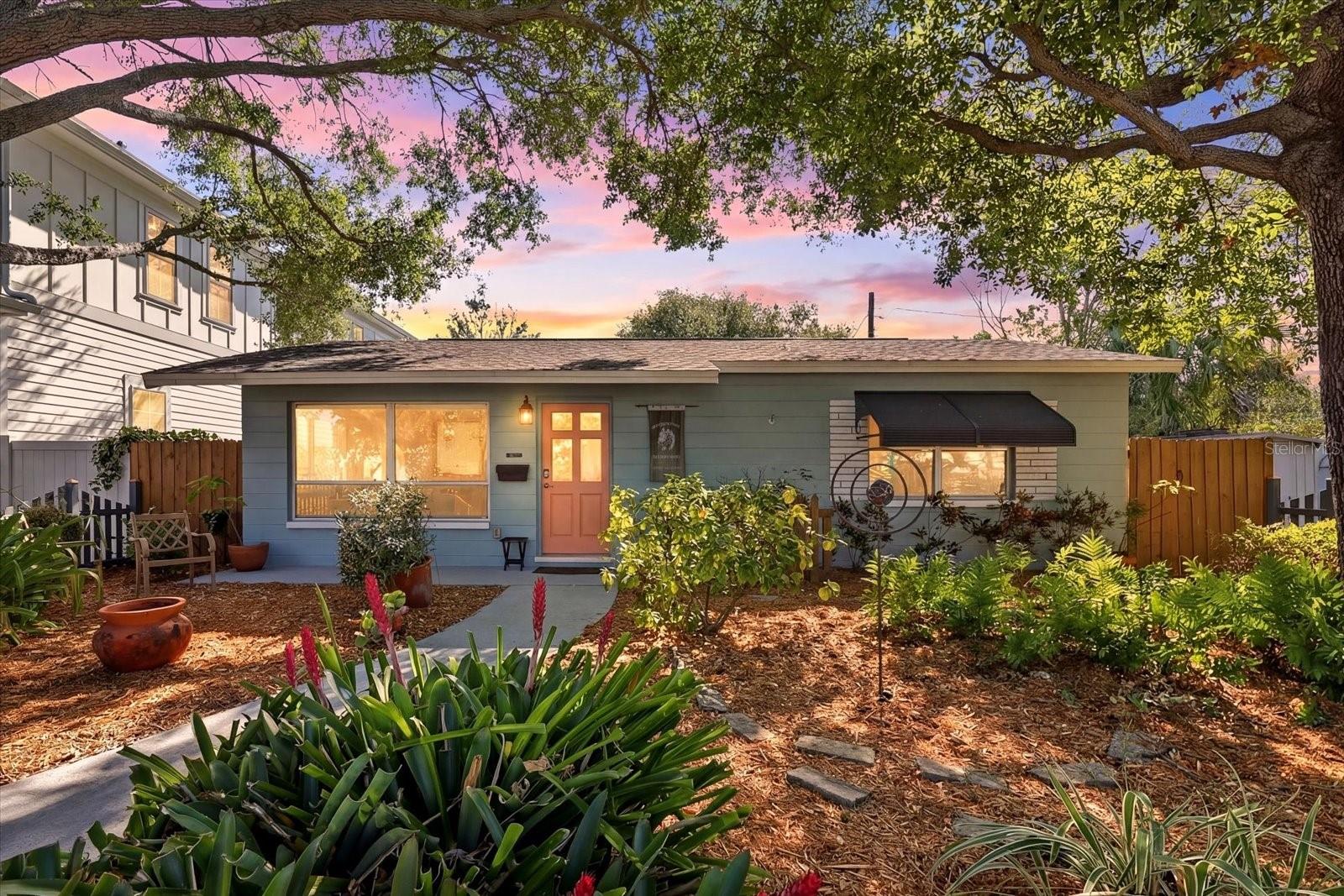 Front exterior at sunset showcasing warm and welcoming curb appeal
