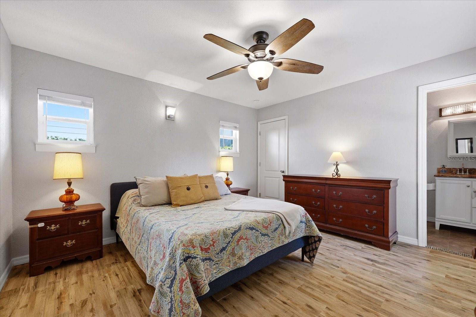 Alternate bedroom view showcasing layout and storage