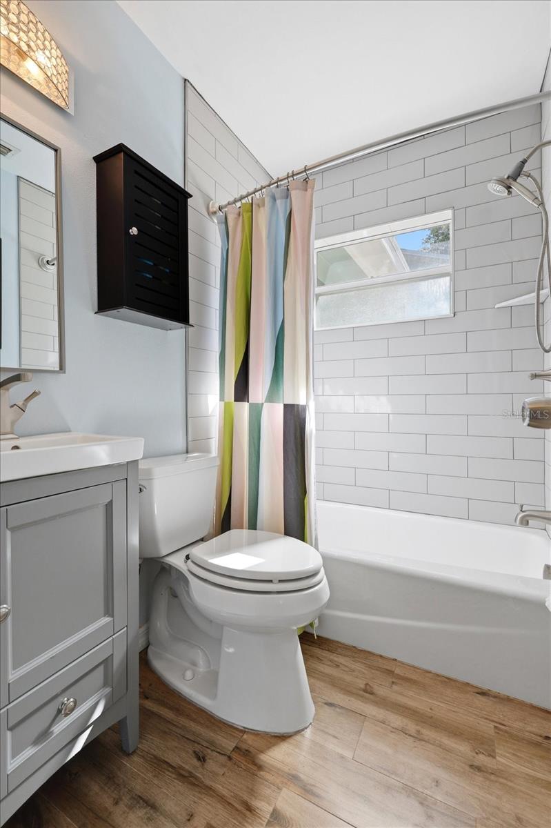 Alternate bathroom view with clean finishes and updated fixtures