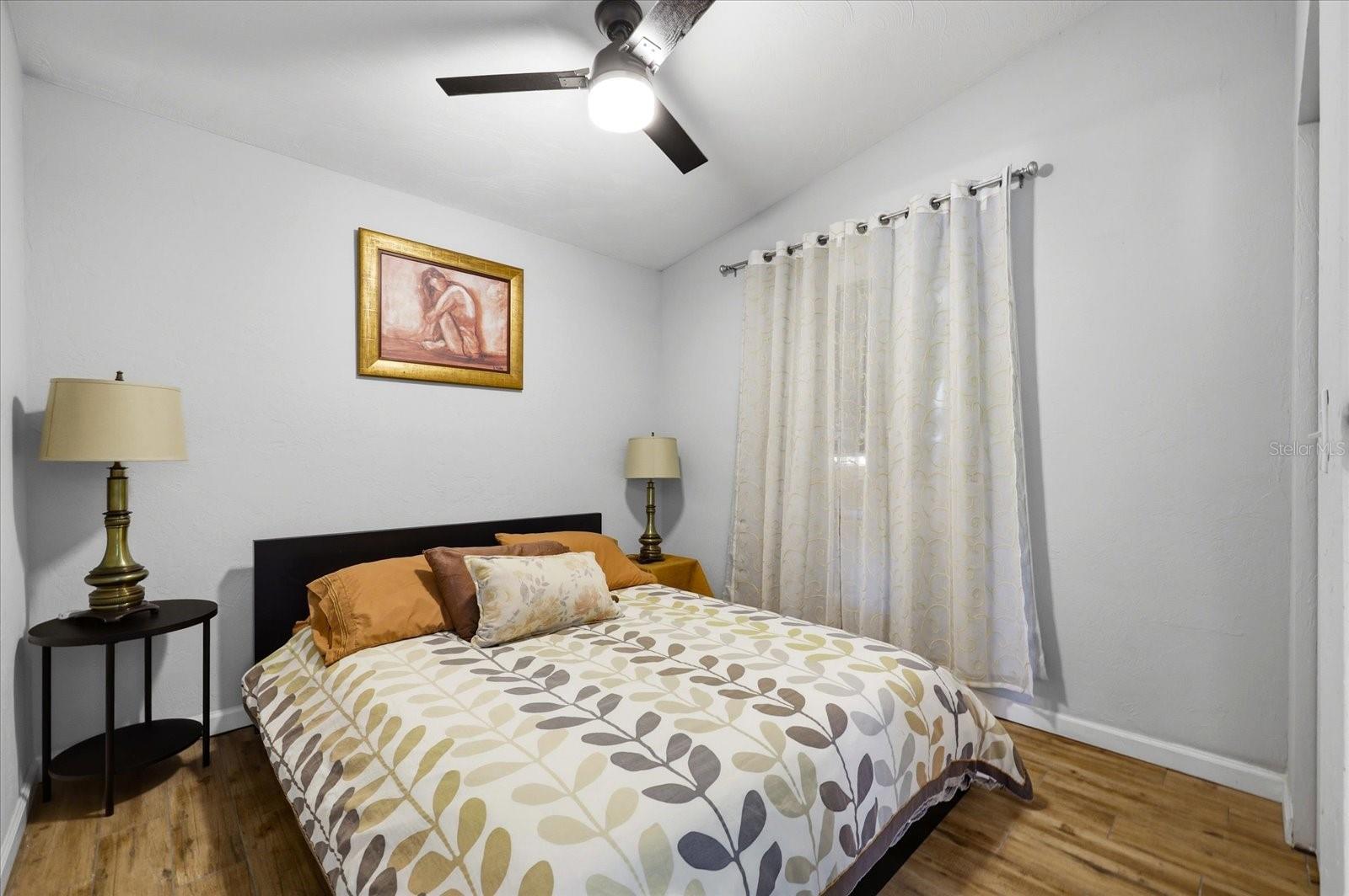 Private ADU bedroom with natural light and neutral finishes