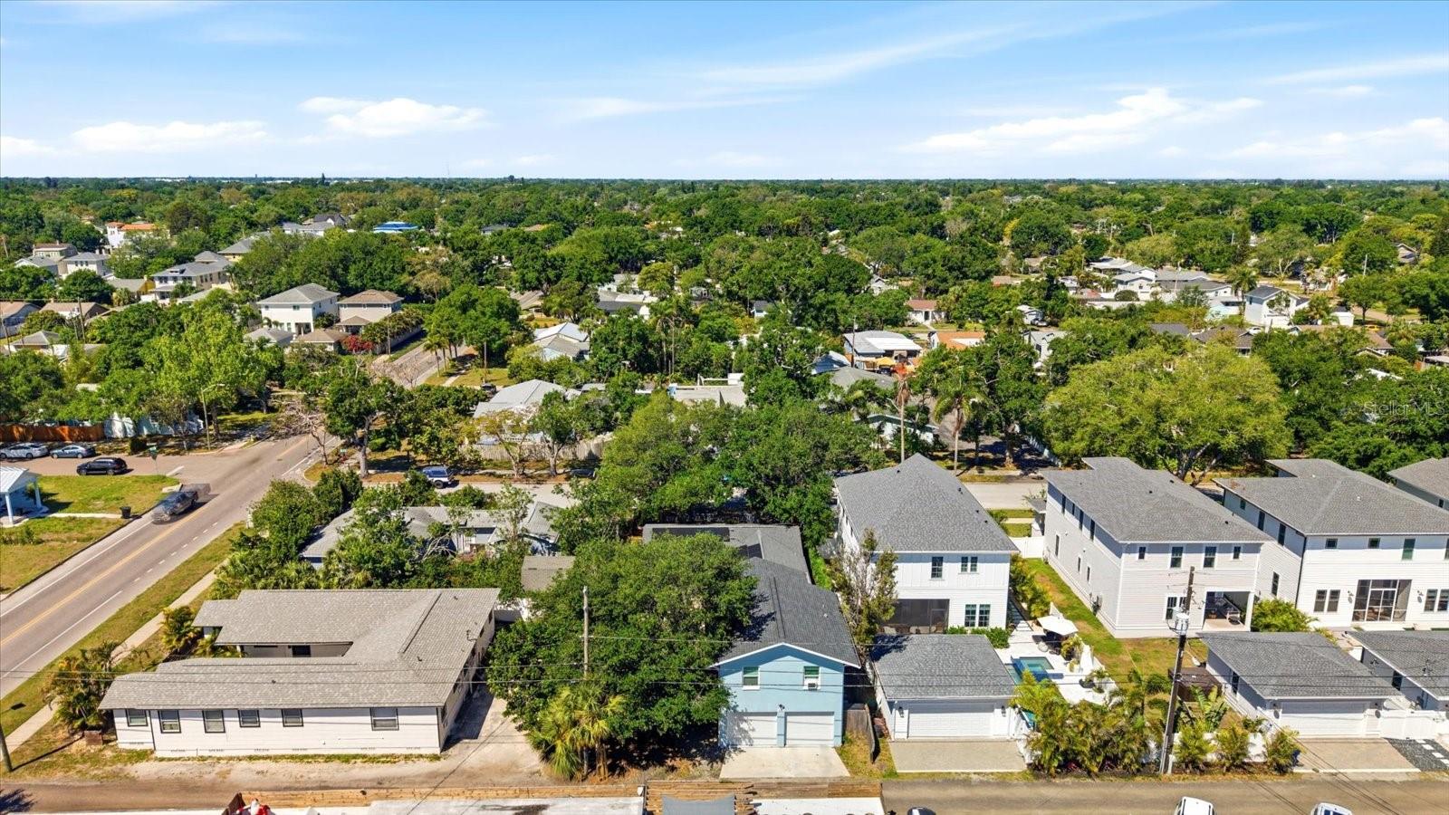 Elevated neighborhood view with distant city skyline