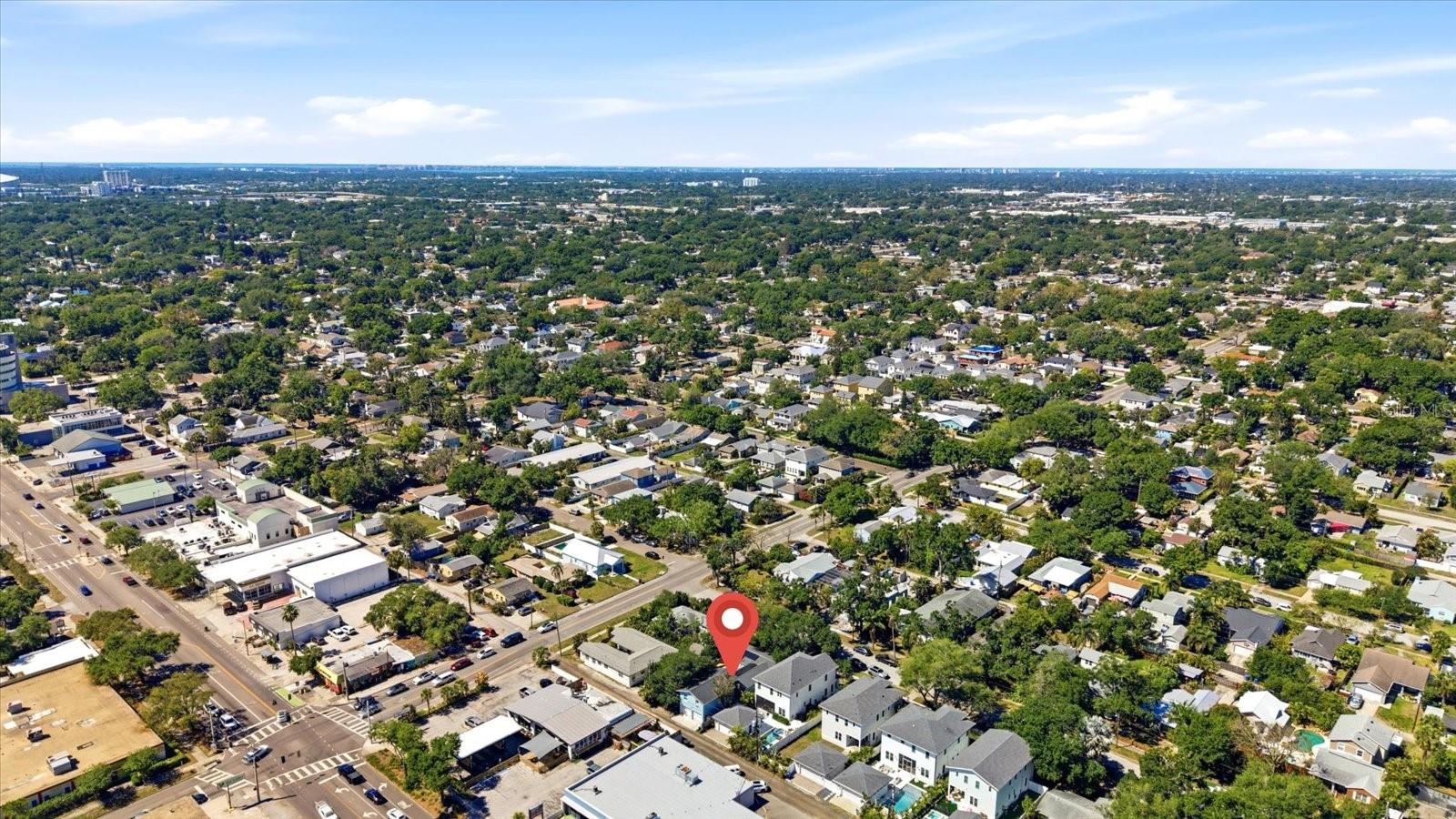 Aerial view pinpointing property location within established neighborhood