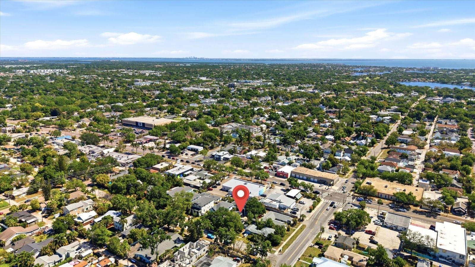 Wide aerial with water views in the distance and central St. Petersburg access