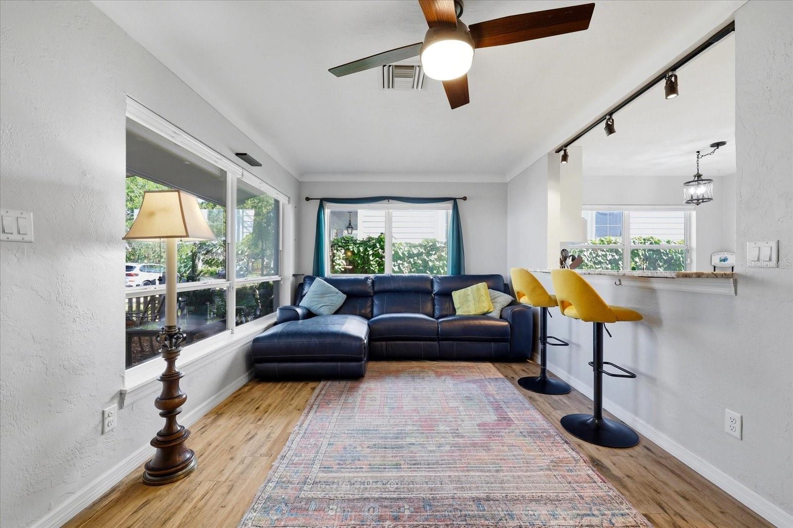 Bright and open living area with large windows and natural light