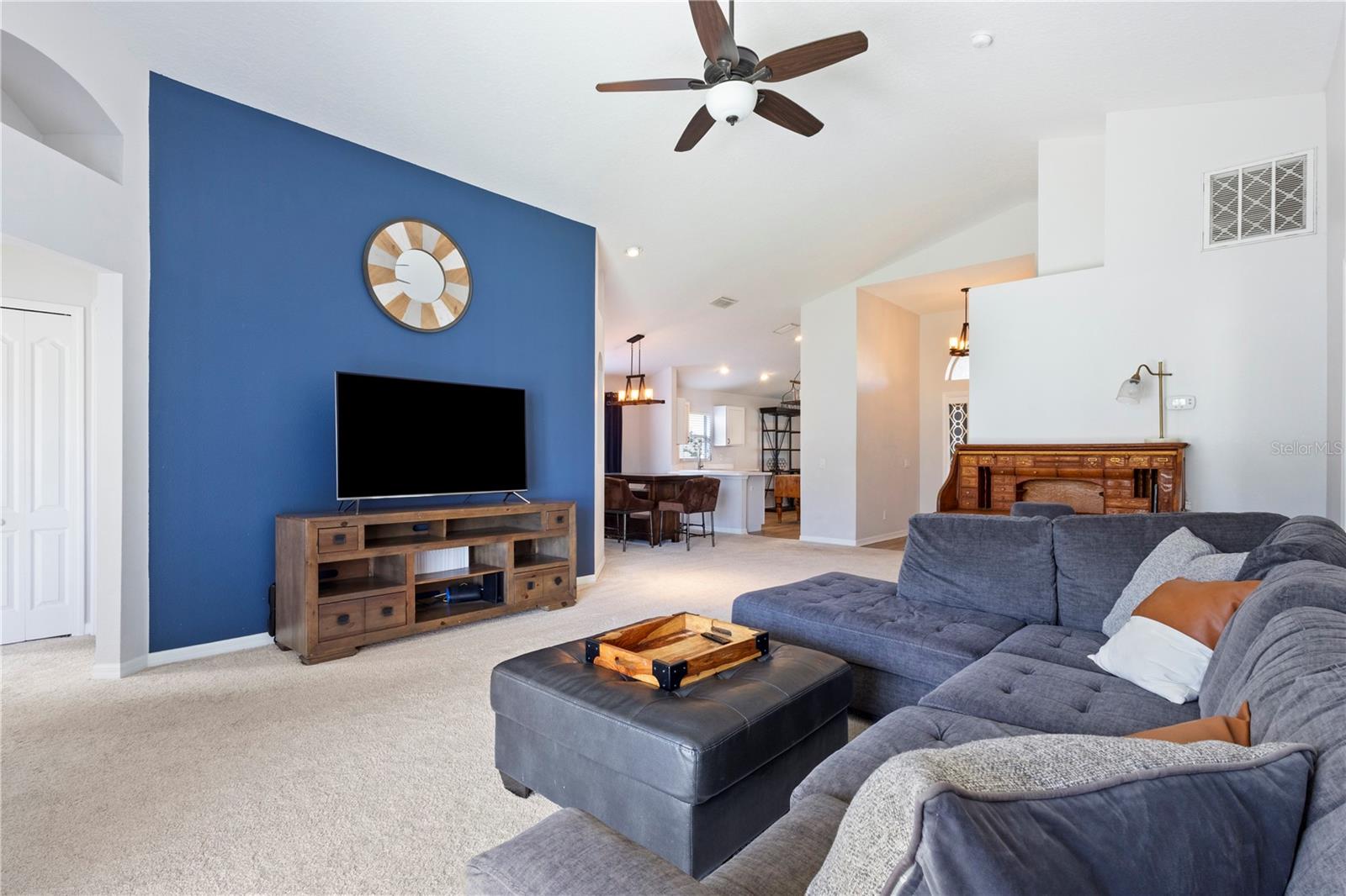 This highlighted wall accents the open concept living area.