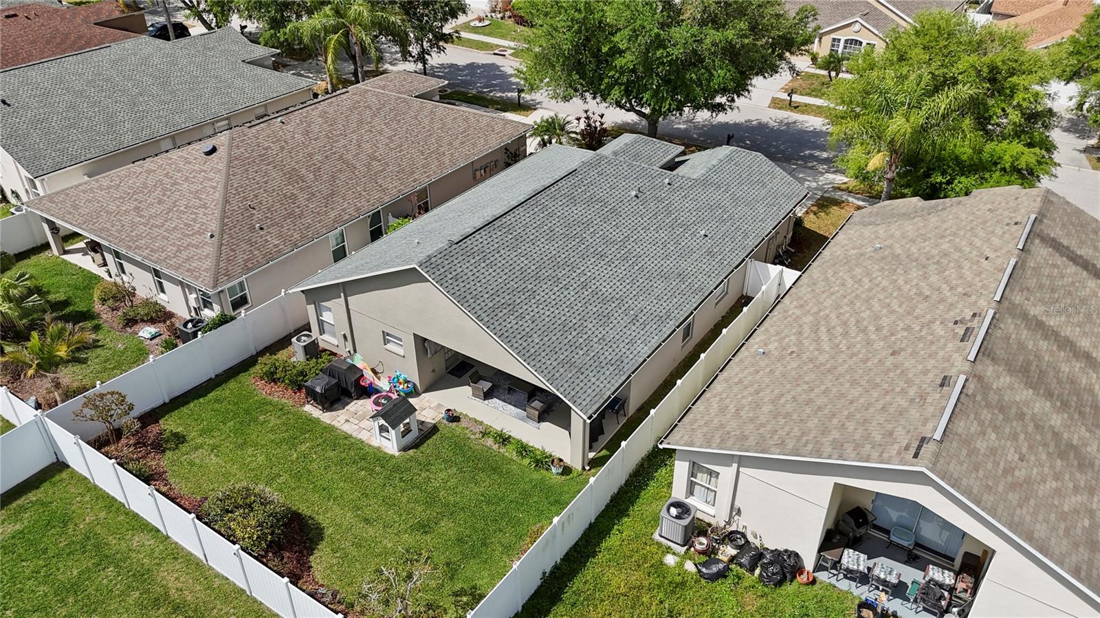 The lush back yard is a true highlight of this homes exceptional features!