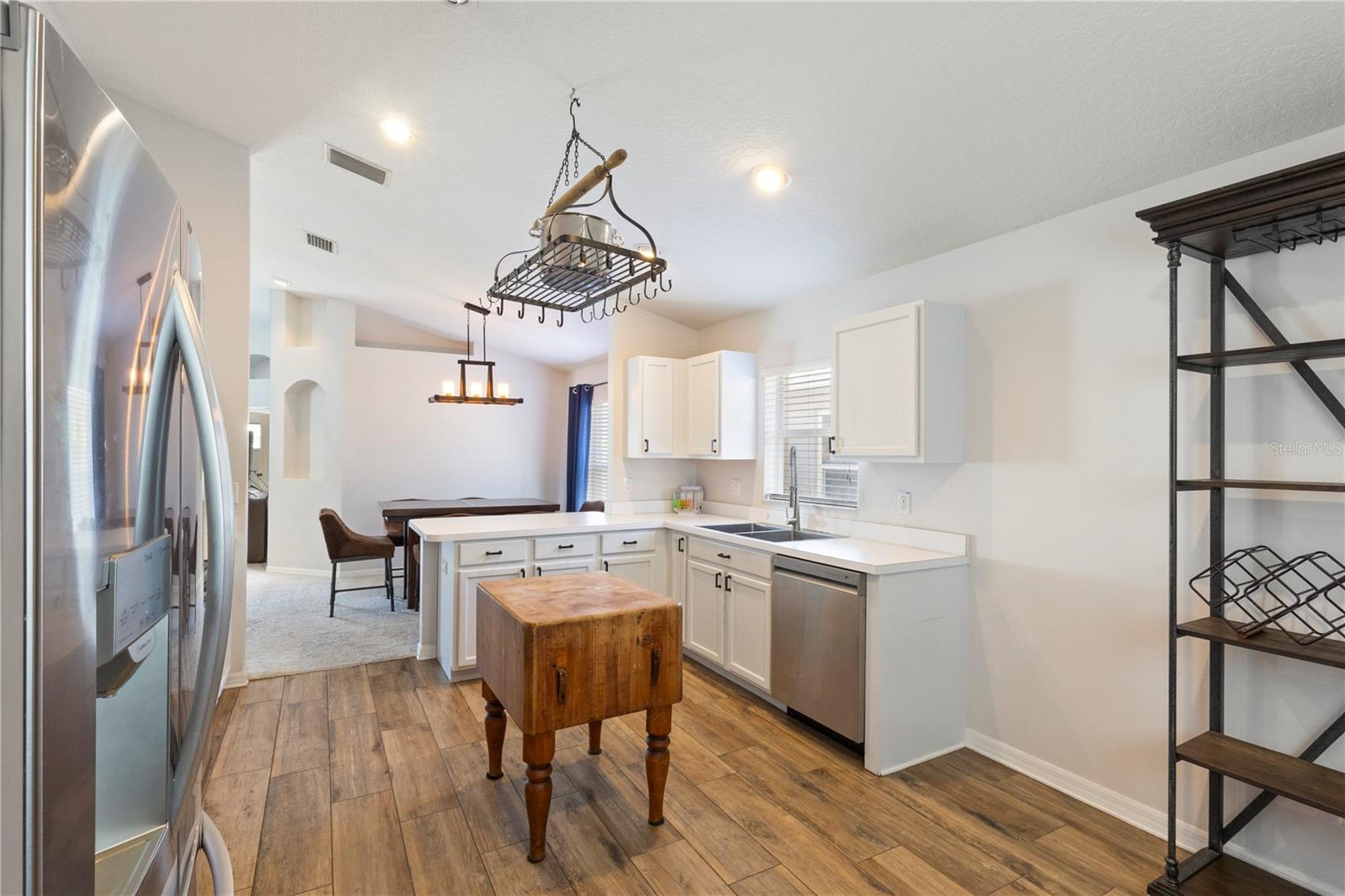 The kitchen/dining space offers room for conversations over preparation of the food!