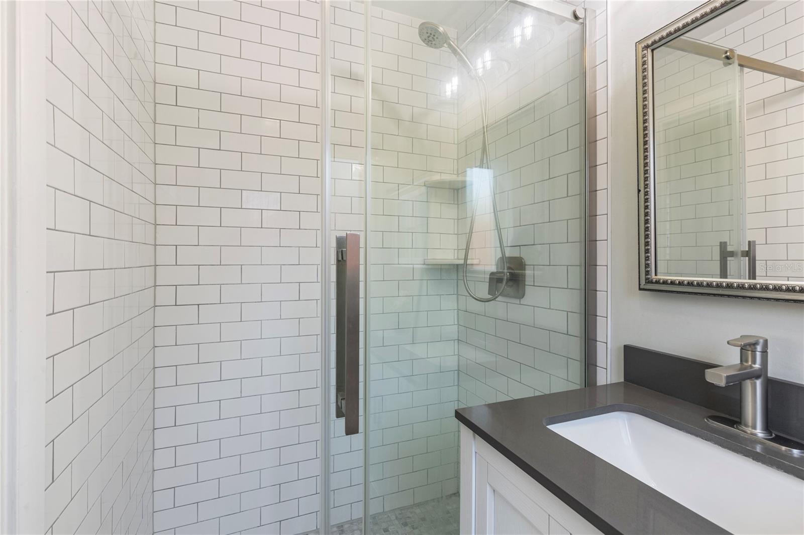 Walk in master shower.