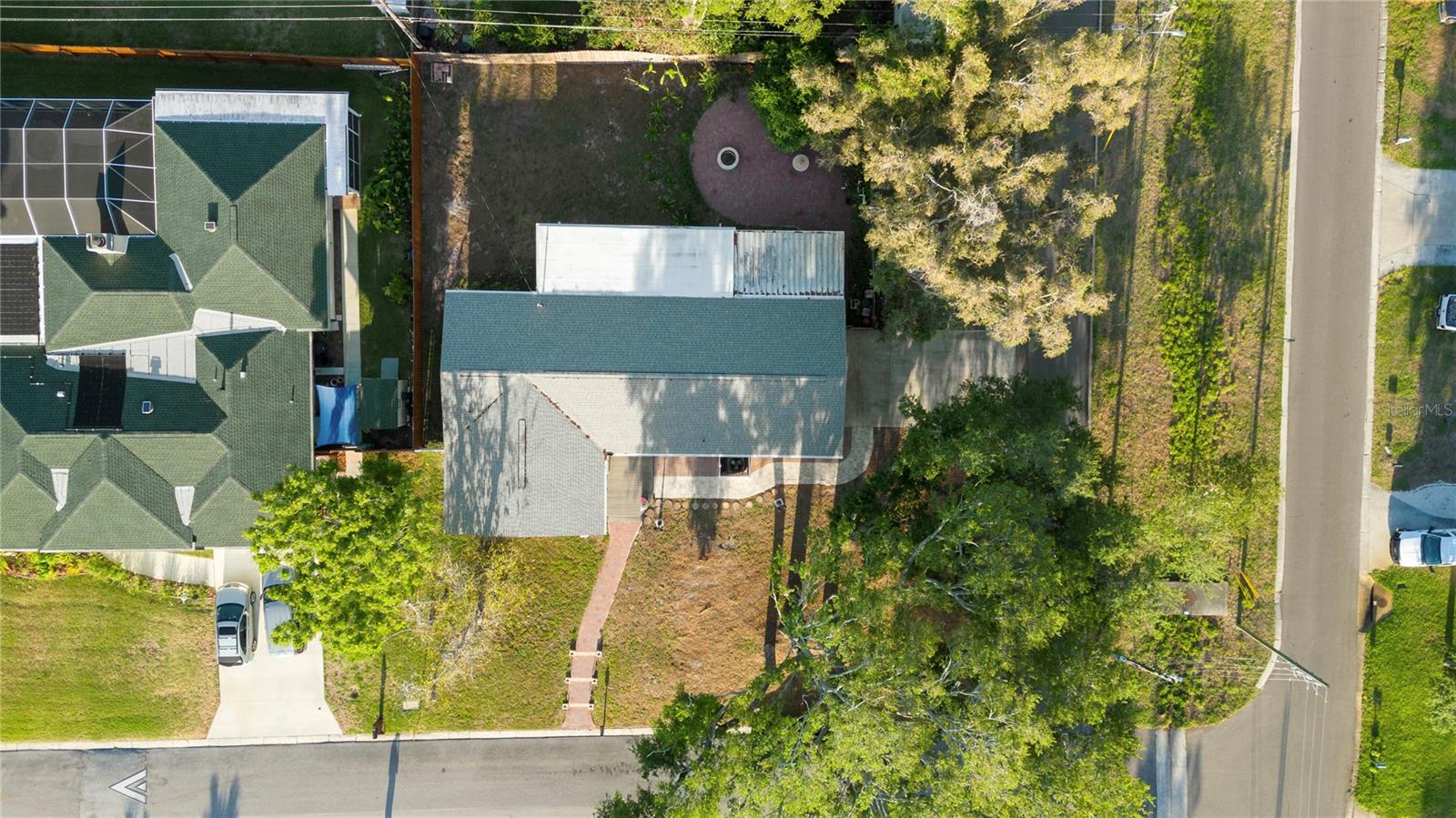 From above, you can see room to add on, build a pool  or relax in the peaceful setting of the backyard.