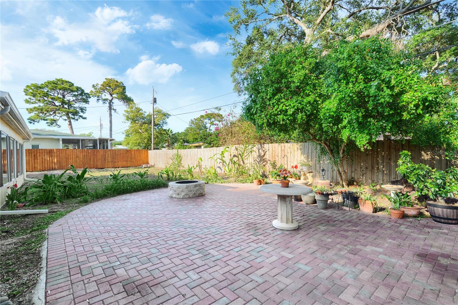 Even with this large outdoor patio, there is still plenty of room to add on, build a pool or add a rentable ADU!
