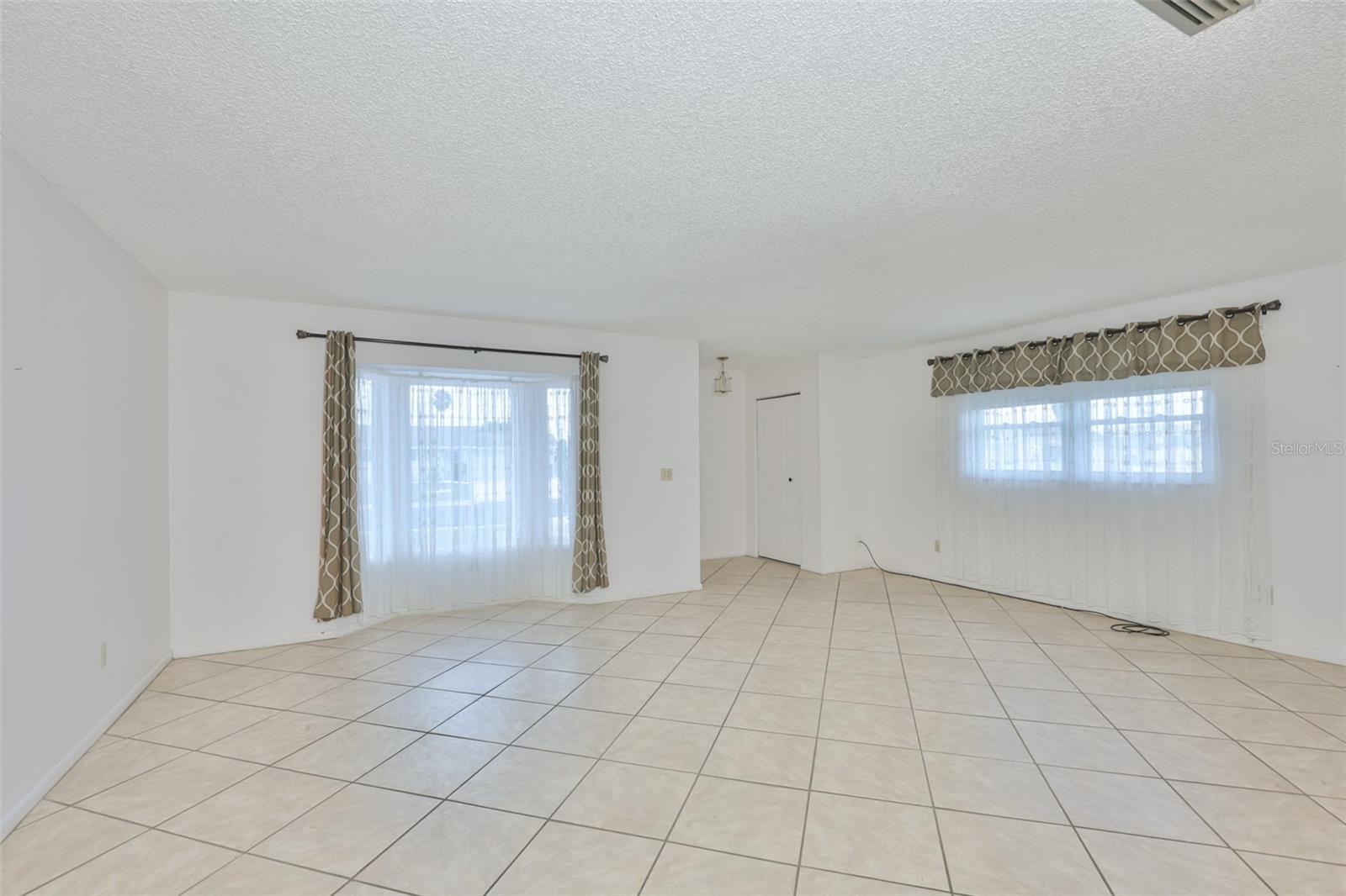 Foyer and living room with Bay Window