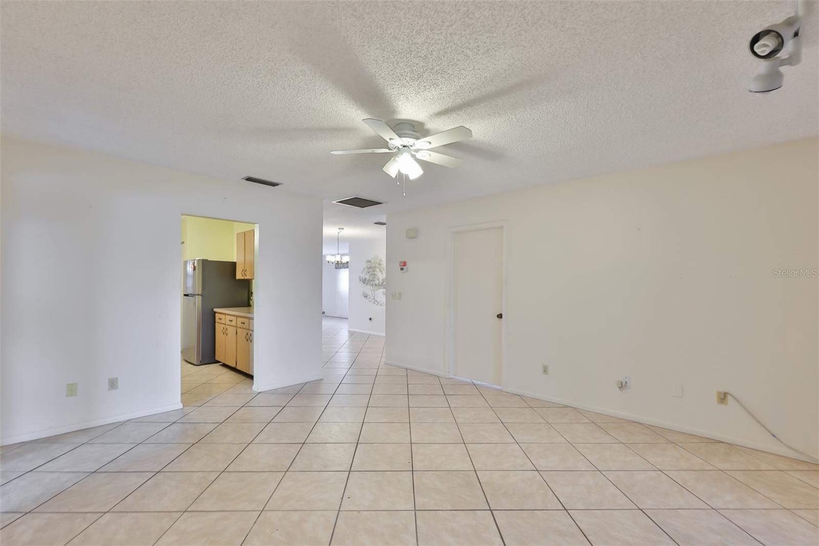 Family Room - Tile on diagonal throughout home