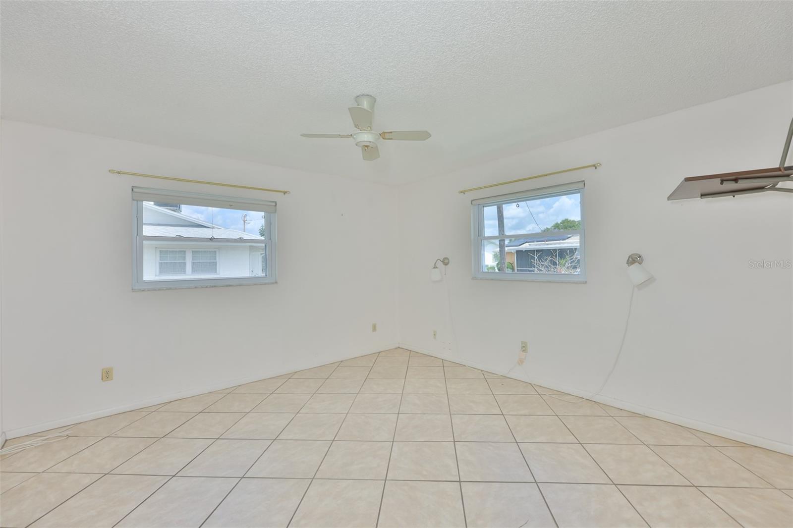Primary Bedroom with ceiling fan