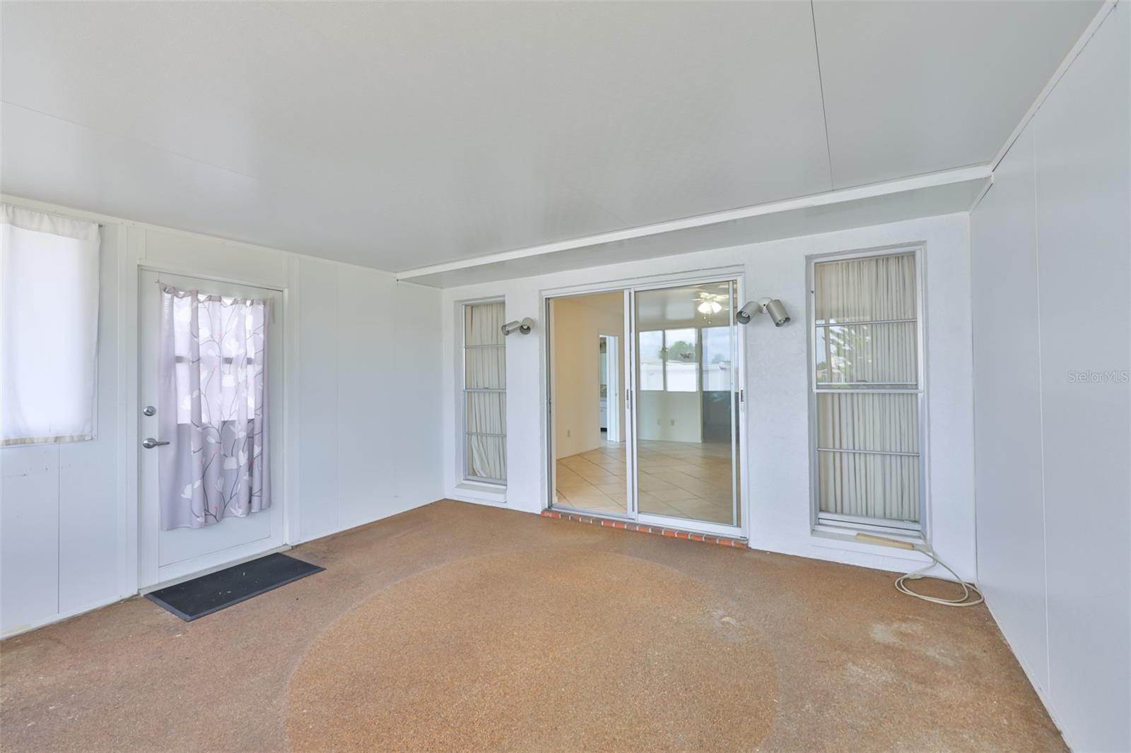 Door to the backyard from Sunroom