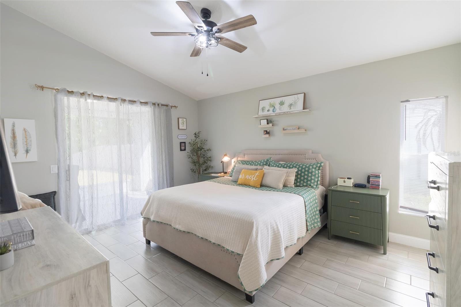 Master Bedroom With Sliding Door to Patio