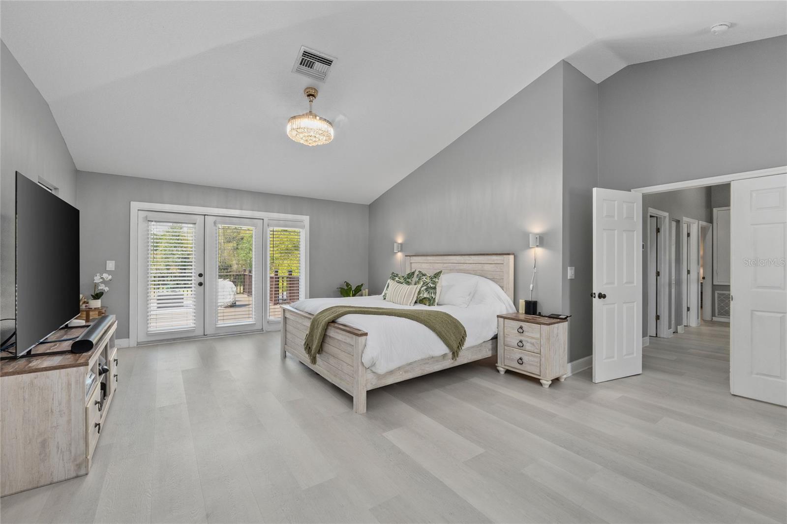 Owners Suite with private deck access!