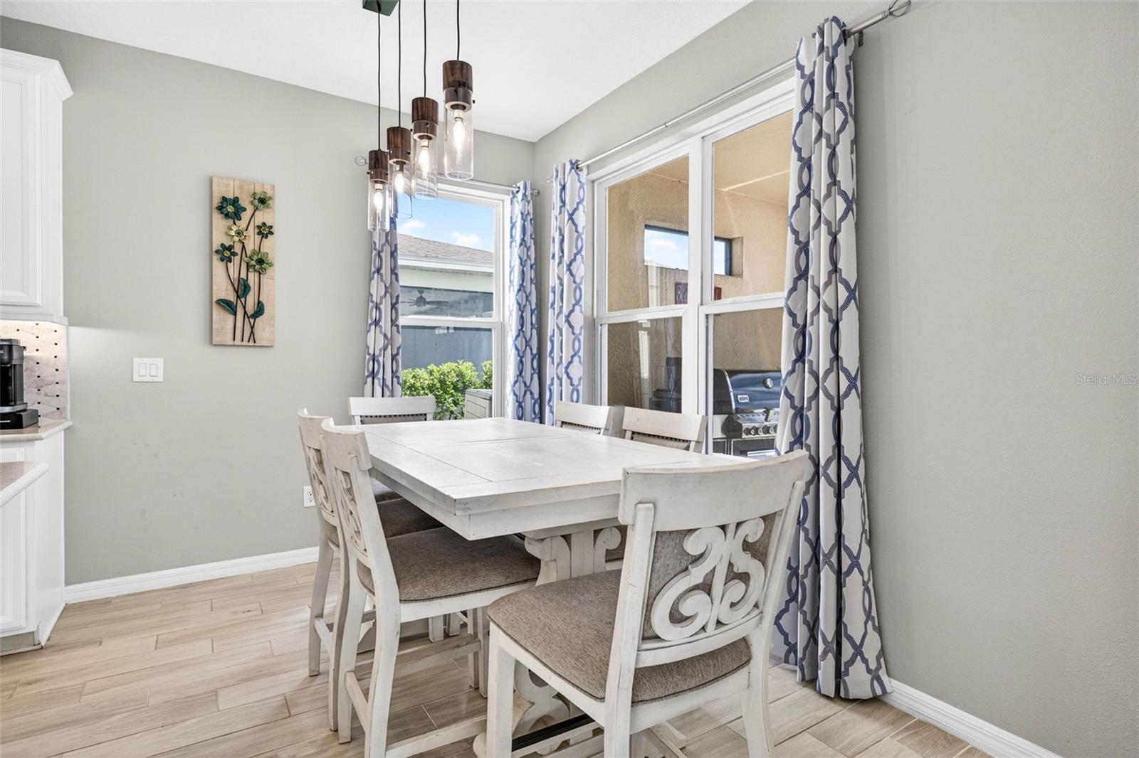 A second dining area just off the kitchen frees up the front room.