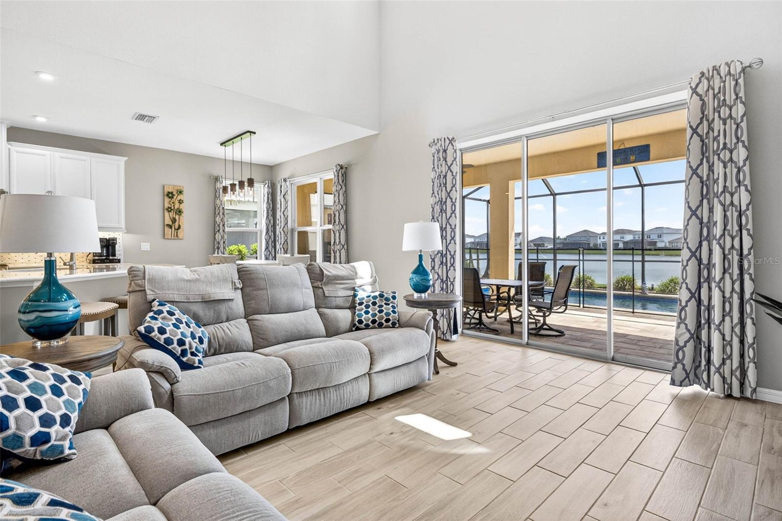 Fit a large sectional + in floor outlets.