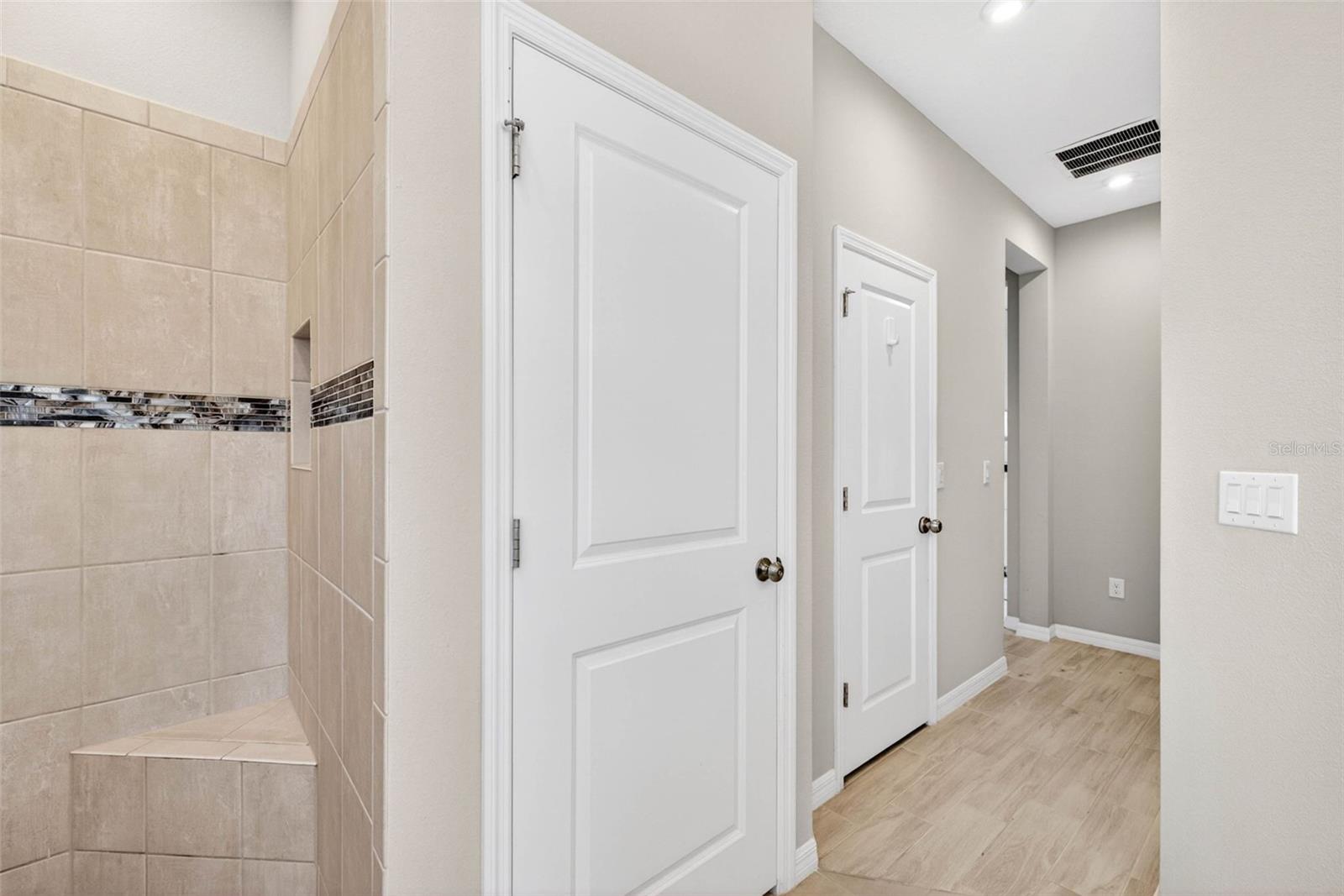View of the DUAL walk in closets in the primary.