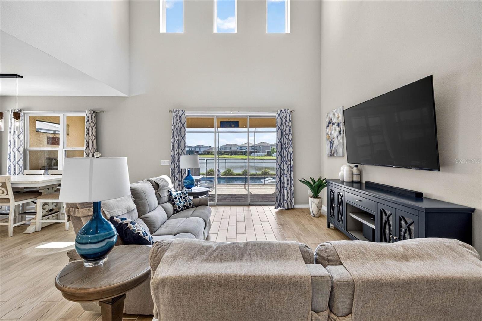 Two story high ceiling in the main living area brings in natural light all day.