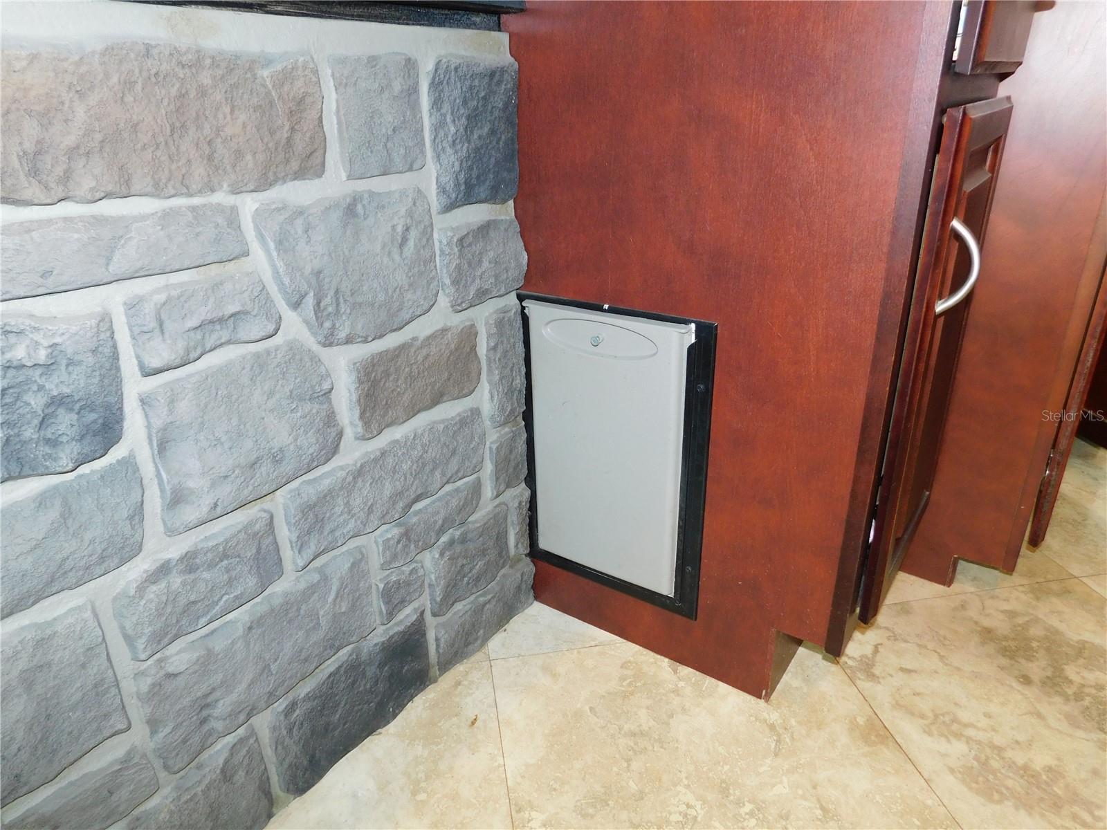 Small dog door to backyard