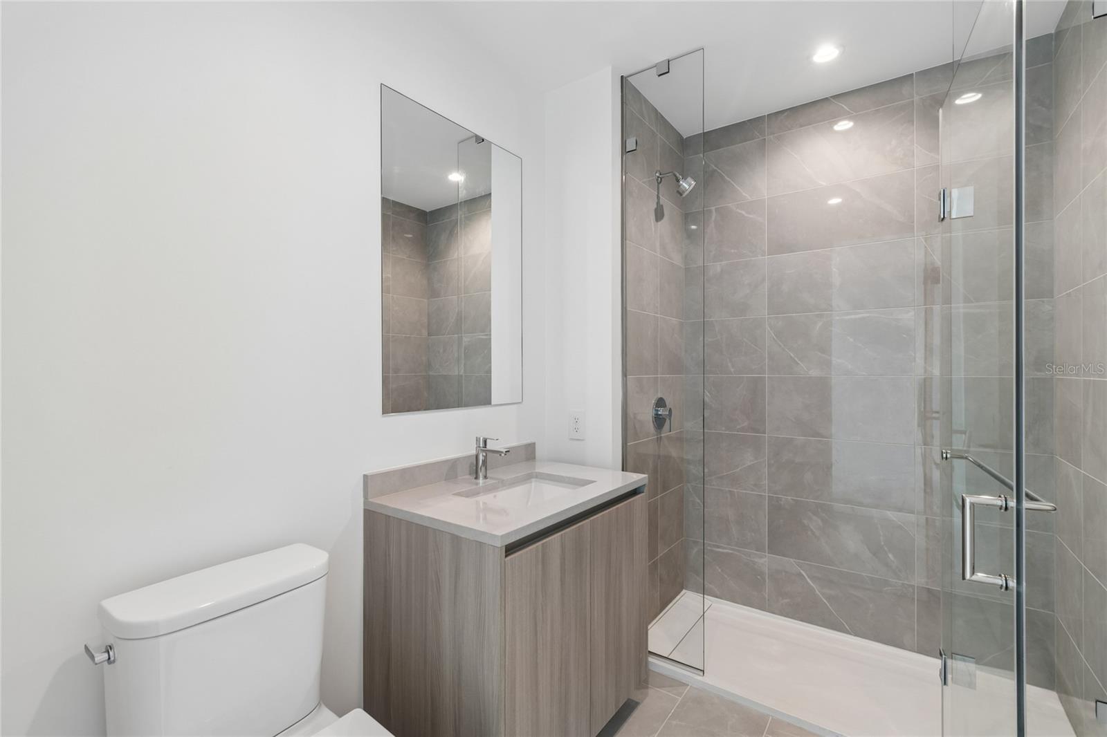 3rd bathroom is a full bath with shower