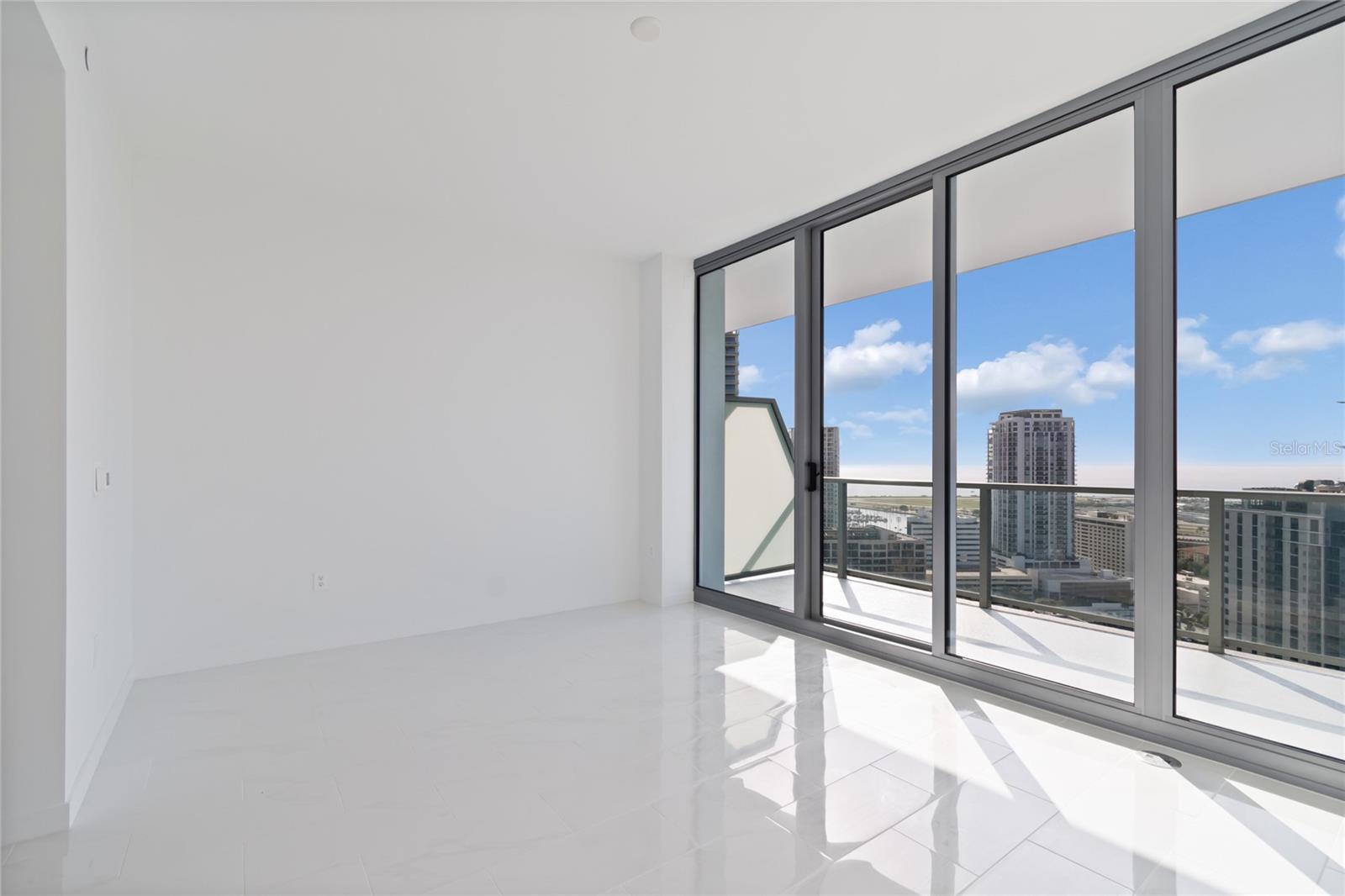 Glossy Porcelain tile runs through out