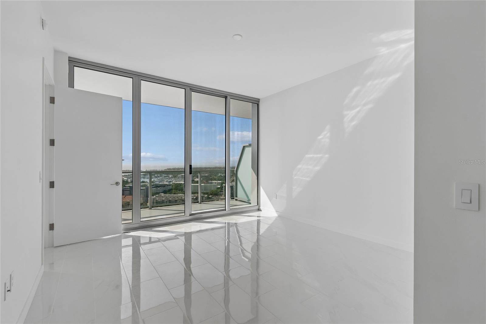 Guest suite also has floor to ceiling sliders opening directly to balcony