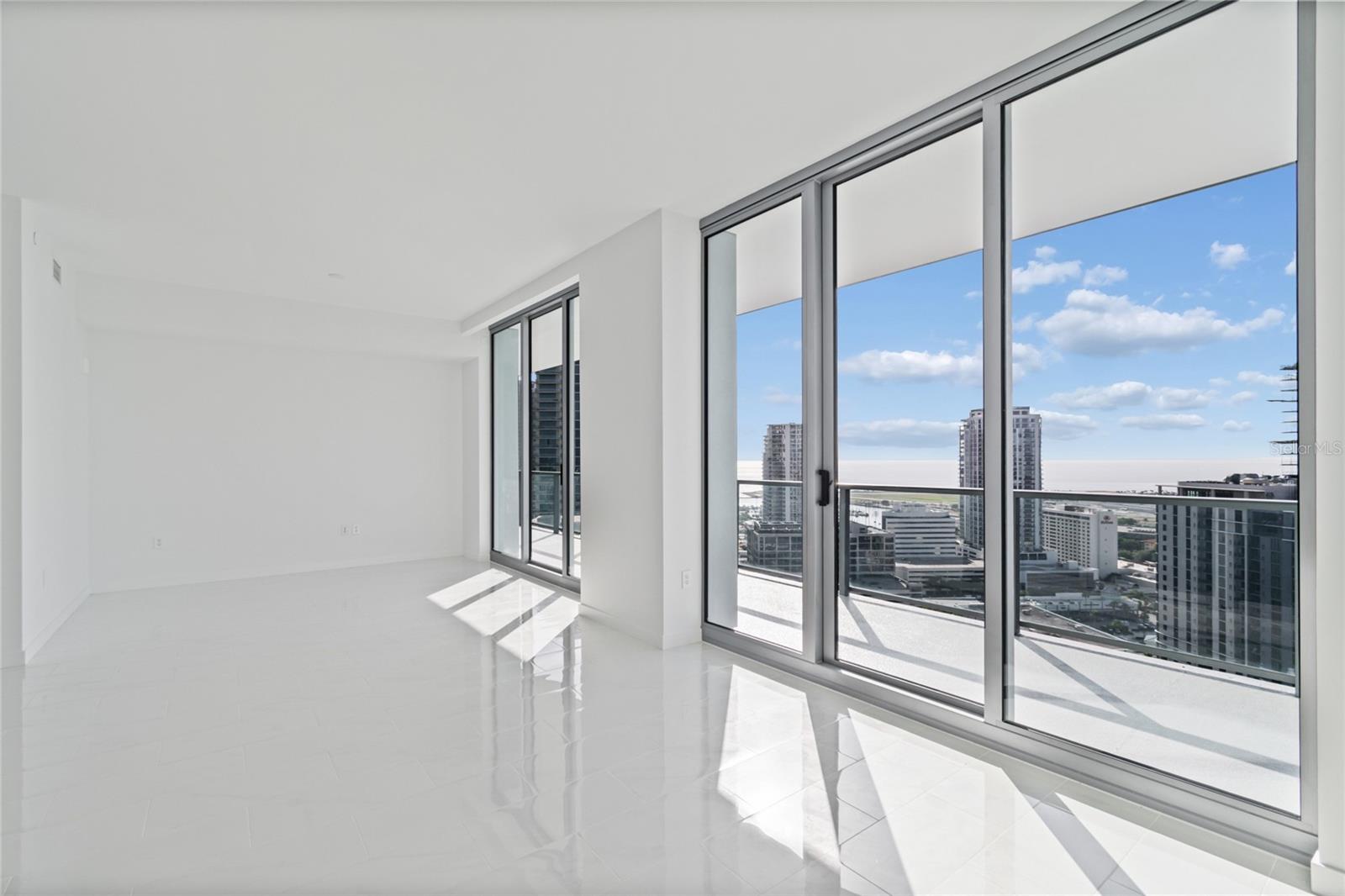 Great room with floor to ceiling glass