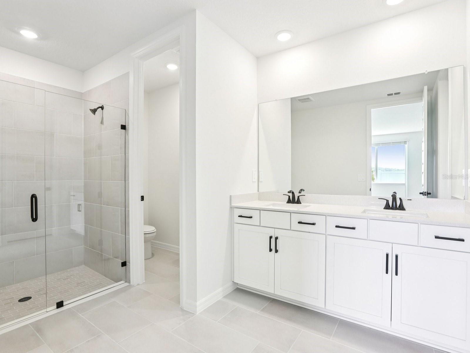 Interior photos are not of the actual home but are photos of the builder home with the same floorplan with similar interior finishes and features.